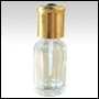 Clear octagonal bottle with plastic applicator and golden cap.Capacity: 2dram( 6ml)