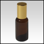 Boston round Amber glass roll on bottle with Golden cap.  Capacity : 33ml (1oz)