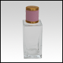 Empire Clear glass bottle with Pink Leather-type cap. Capacity: 56 mL (about 2oz) at neck. 