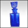 Blue glass rectangular shaped bottle with glass stopper. Capacity : 9ml (1/3oz)