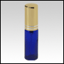 Cobalt Blue Glass, refillable, cylindrical bottle with Silver-ringed Gold metal sp