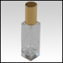 Sleek clear glass bottle Gold treatment pump and cap.Capacity: 30mL (1oz).
